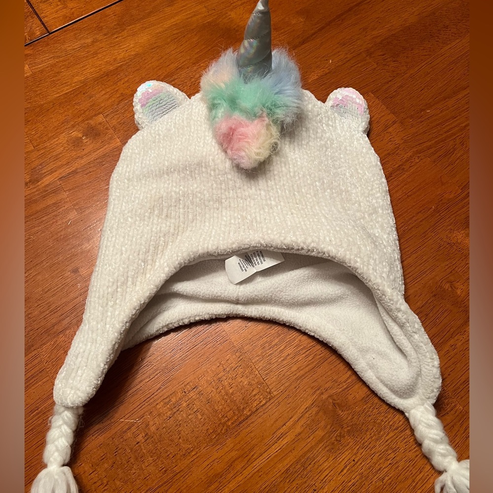 Adorable Children’s Place girls’ winter hat with unicorn design, sequined ears